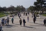 People walk through Les Jardins des Tuileries park in Paris, France, on March 31.