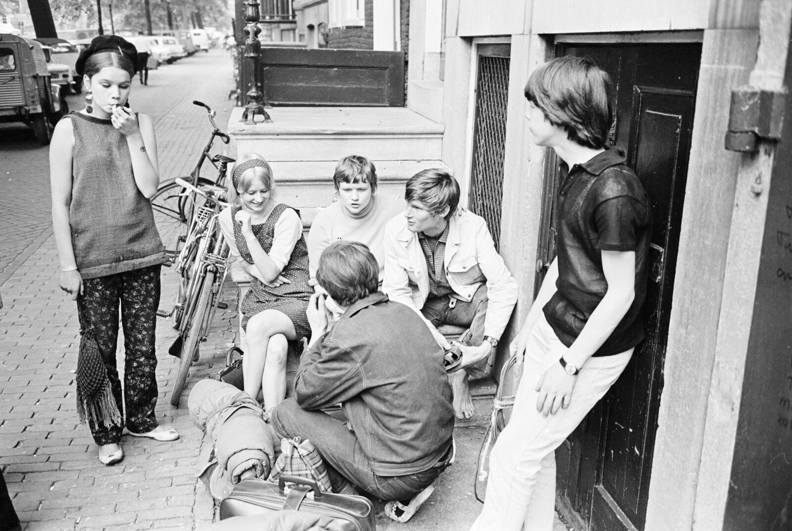 Members of the counterculture group Provo gather in Amsterdam in&nbsp;1966. The group launched a free bikesharing program called the White Bicycle Plan that’s considered the forerunner of today’s municipal fleets.