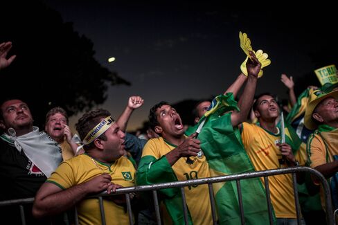 Protesters watch the Congressional vote for impeaching Rousseff on Sunday.