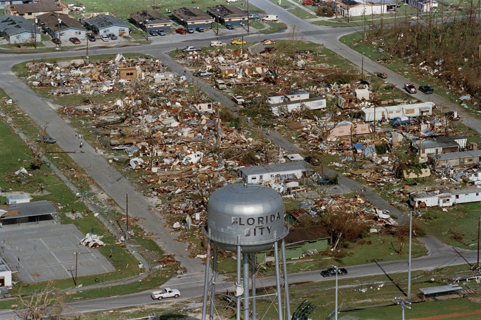 A water tower in Florida City, Florida, remains standing over beside the damage caused by Hurricane Andrew, in 1992.