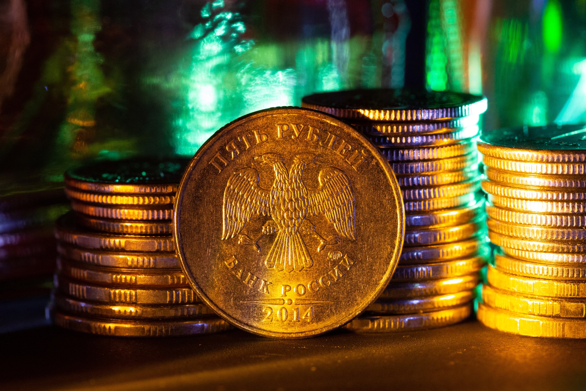 Hand Holding Money Bag Full of Gold Coin Graphic by enway