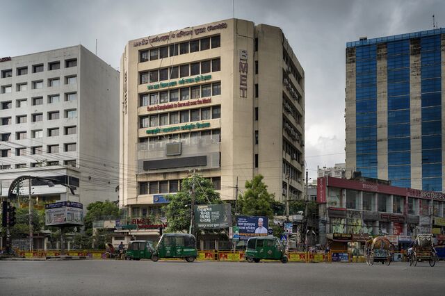 A sign reading “Born in Bangladesh to serve all over the world” outside the Bureau of Manpower, Employment and Training in Dhaka in June.