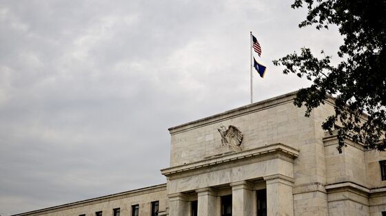 Traders Hedge Against Zero Fed Rate as Talk of Crisis Cut Swirls