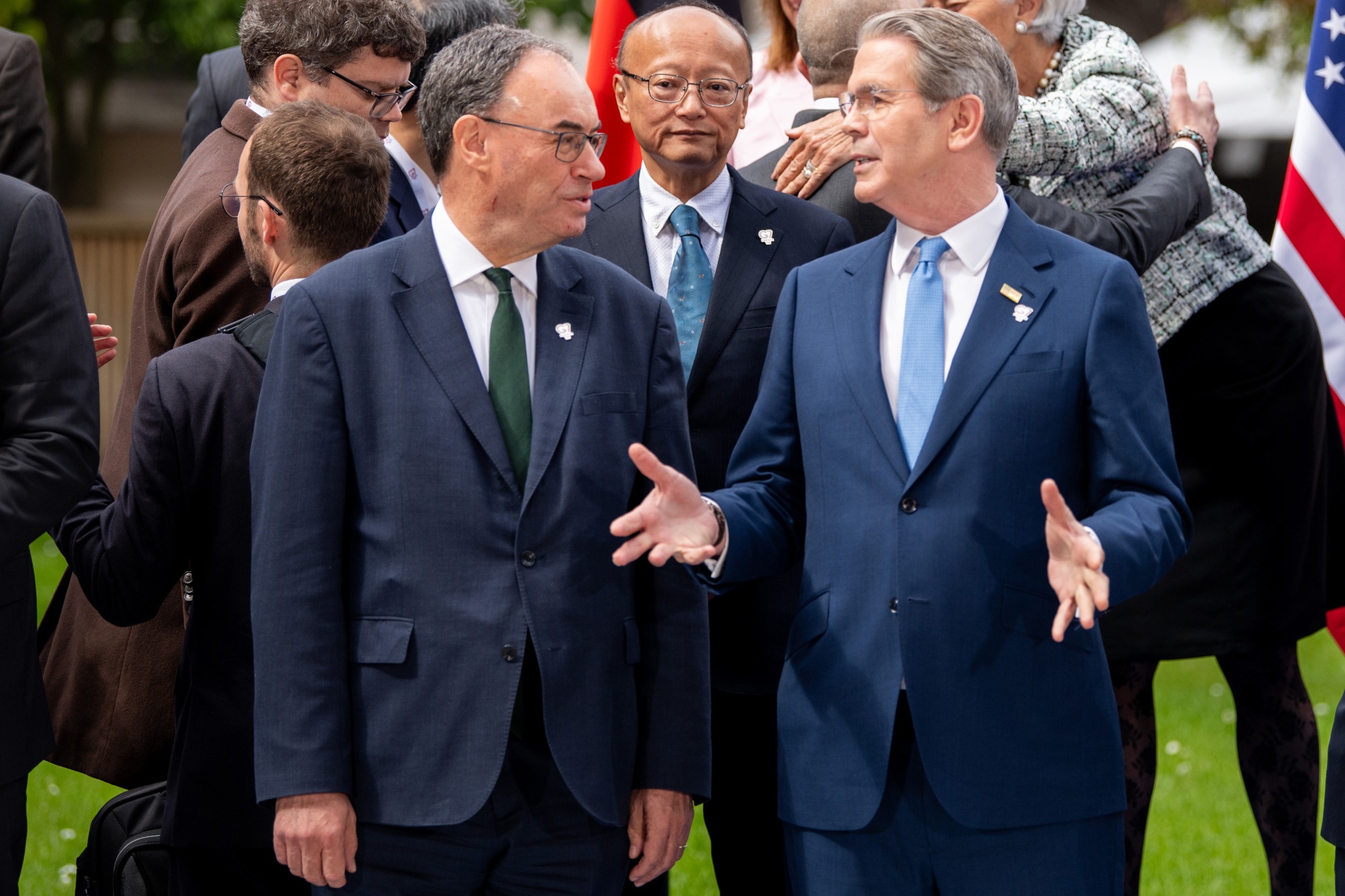 Andrew Bailey, governor of the Bank of England, left, speaks with Scott Bessent, US treasury secretary, during the 'family photo' during the G-7 finance ministers and central bank governors meeting in Paris, France, on Monday, May 18, 2026. While the talks in Paris were meant to dwell onimbalancesranging from the US budget deficit to Chinas weak consumption, ministers and central bankers are preoccupied by a another day of spiking yields, driven by investor concerns about consumer prices. Photographer: Benjamin Girette/Bloomberg