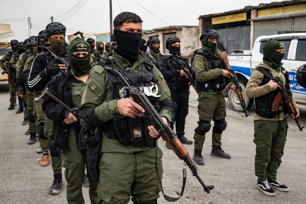 Syrian Kurdish forces during a raid against suspected Islamic State group fighters in Raqa, last year.