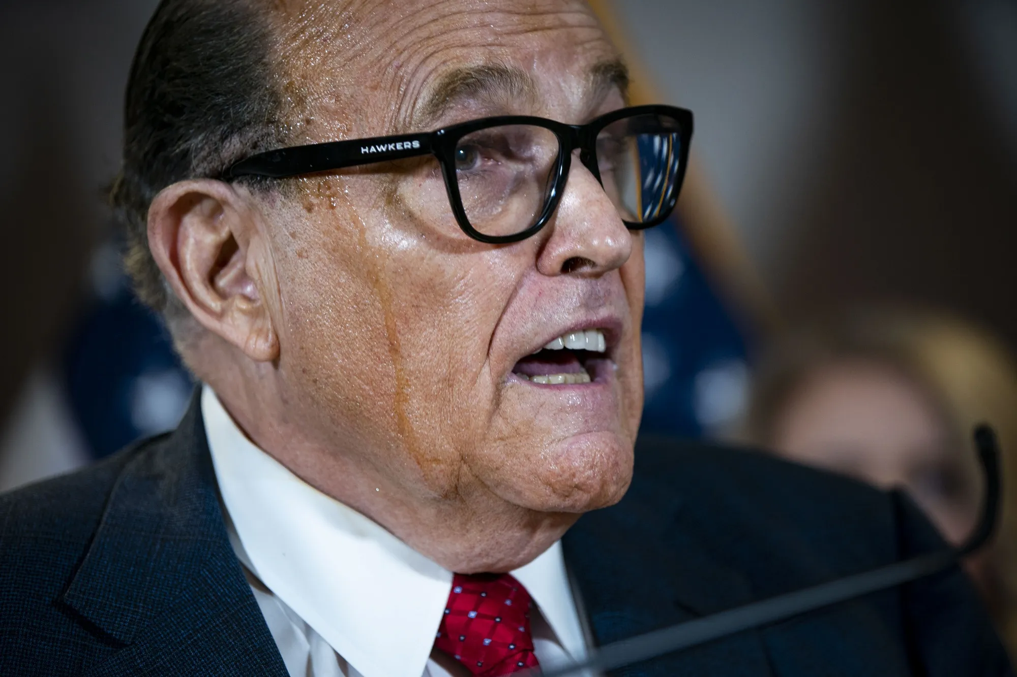 Suddenly Rudy Giuliani looks a lot like Marc Rich.