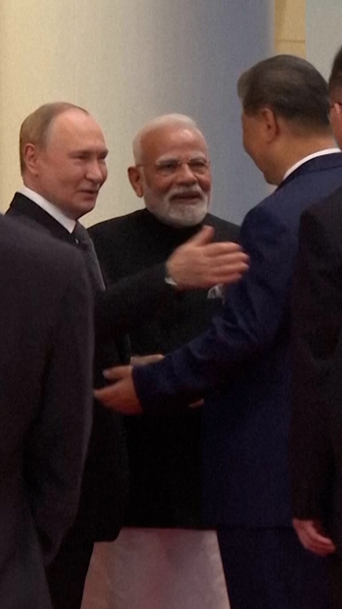 Putin, Modi, Xi Huddle at China Security Summit
