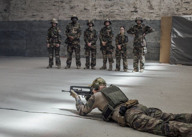 Matthieu, a second lieutenant in the French Armed Forces' 19th Engineer Regiment, during a firing drill with recruits at a reservist training camp in Besancon, on April 30.