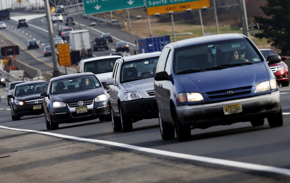 Cars travel on the crowded New Jersey turnpike.