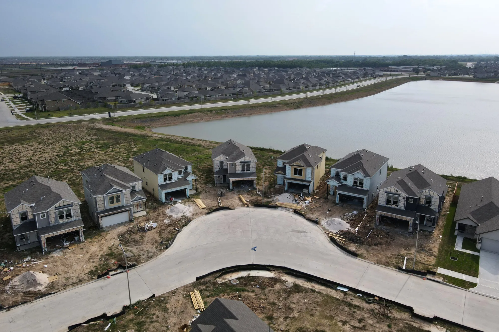 New homes under construction in Arcola, Texas, in July.&nbsp;