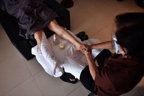Thai Massage Loses Its Charm Behind Masks, Social Distancing