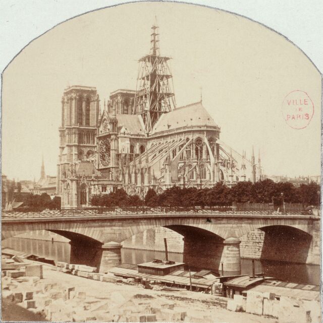 A historical image of Notre-Dame’s spire under construction in 1860