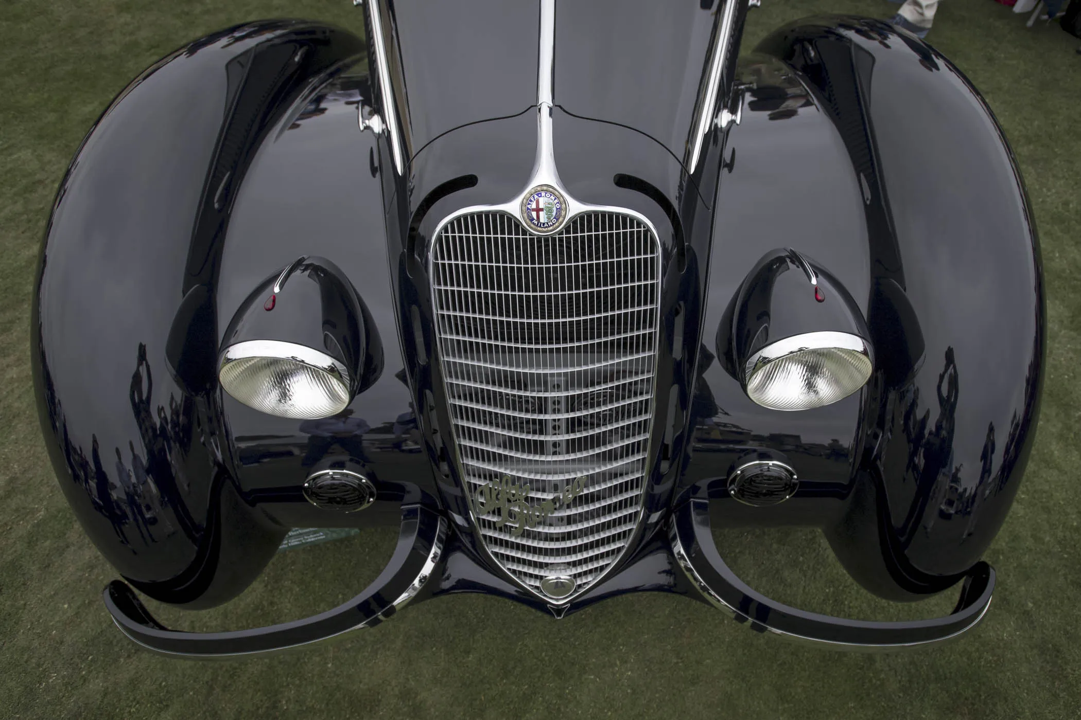 The 1937 Alfa Romeo 8C 2900B Touring Berlinetta vehicle is displayed at the Concours d’Elegance in Pebble Beach, Calif., on Sunday, Aug. 26, 2018. More than 20,000 car enthusiasts gathered for the event, where total auction sales were expected to bring in $342 million this year.