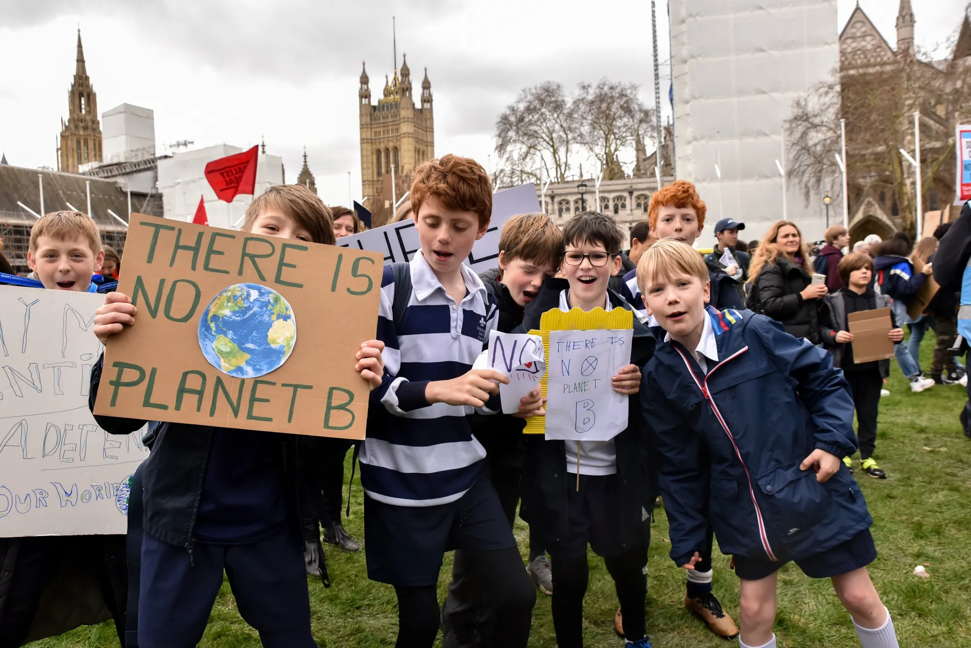 Thousands of young people and school children protest in central London over climate change.