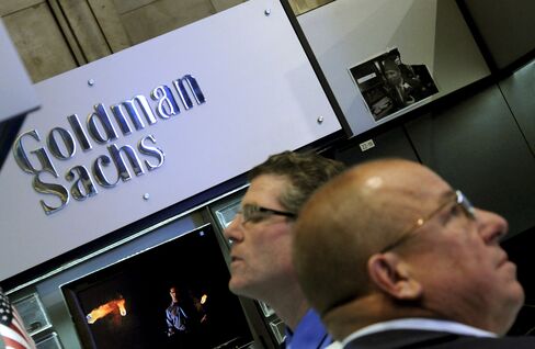 Goldman, JPMorgan Ordered to Fix Capital Planning in Fed Tests