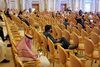 Participants sit beside empty seats on the opening day of the Future Investment Initiative (FII) conference at the Ritz Carlton Hotel in Riyadh, Saudi Arabia, on Tuesday, Oct. 23, 2018. Saudi Arabia planned to announce a raft of deals in energy and base metals at its signature investment forum even as it struggled to overcome international outrage over the killing of a government critic.