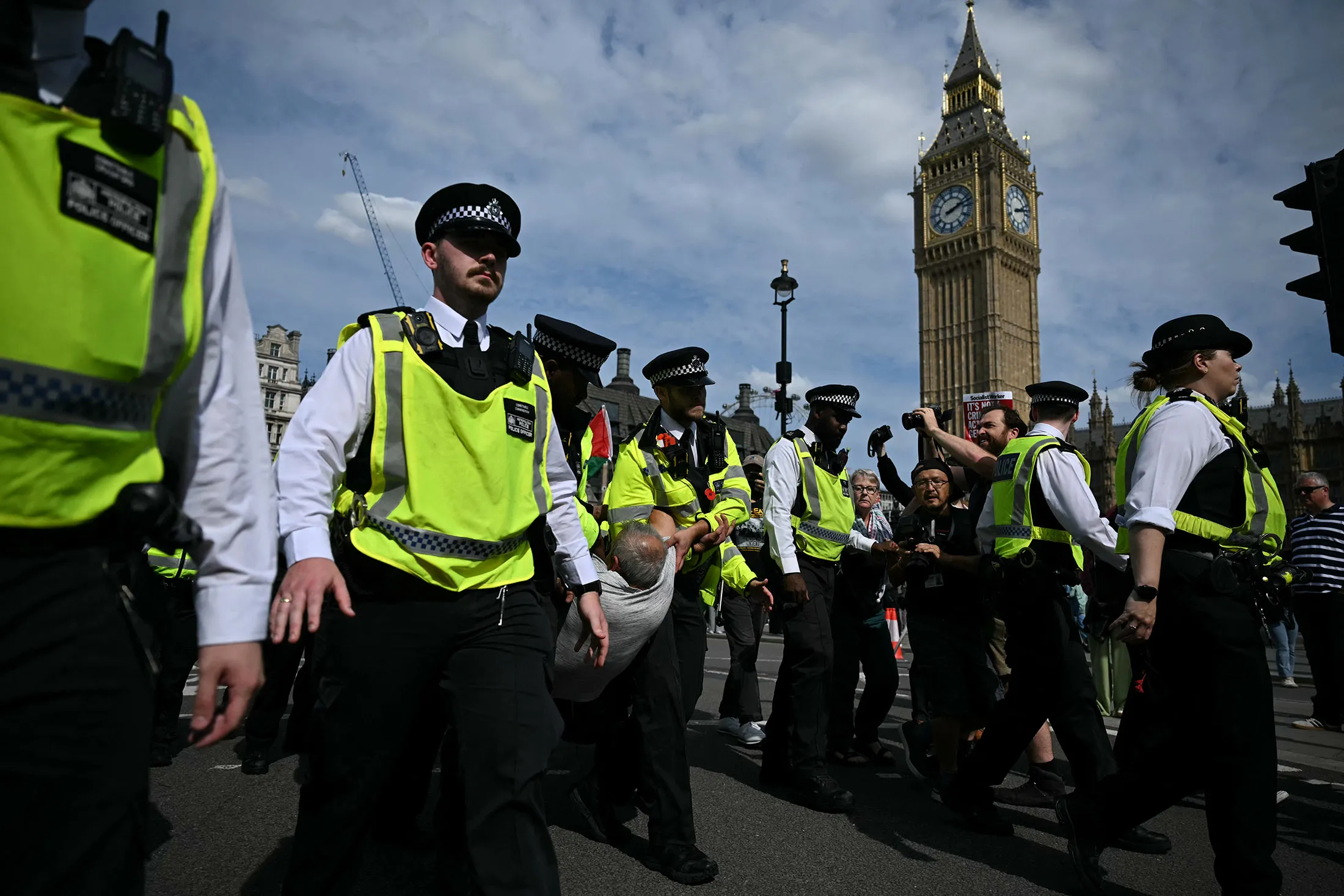 A protester is carried away by police officers during a demonstration in support of Palestine Action, in London, last September.&nbsp;