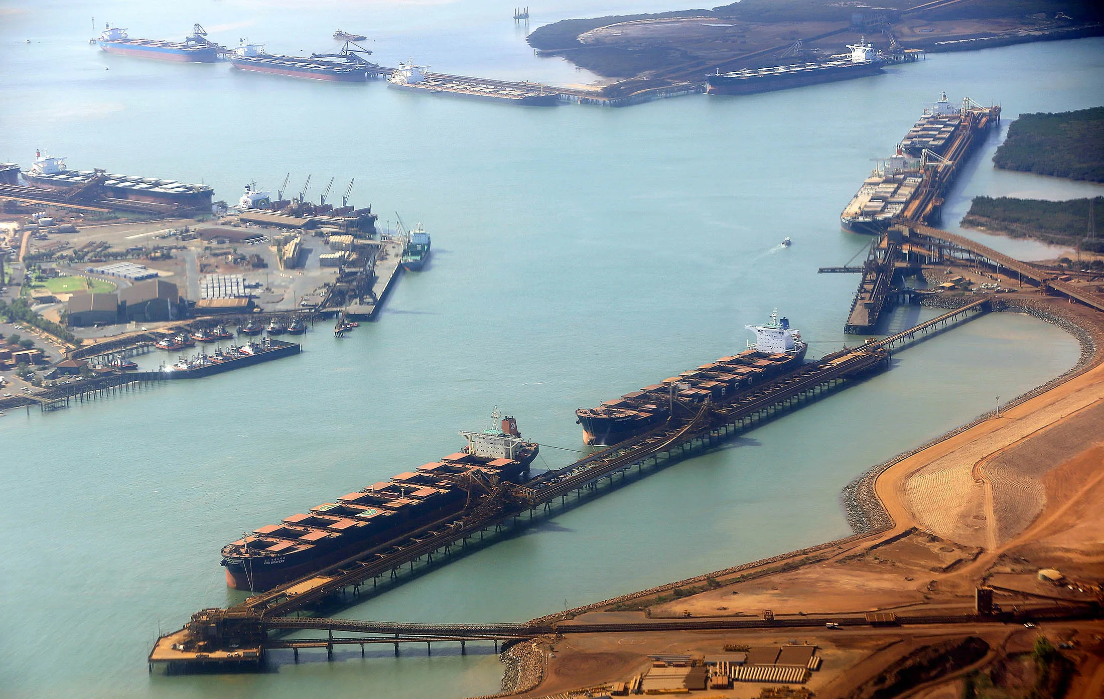 Cargo ship are loaded with iron ore at the ship loading facility in Port Hedland.
