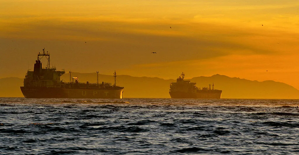 Oil tankers are anchored near the Port of Long Beach, California, U.S., on Thursday, Dec. 31, 2009. A surplus of idled oil tankers, which would stretch 26 miles if lined up end to end, may signal a 25 percent slump in freight rates this year. The ships will unload 26 percent of the crude and oil products they are storing in six months, adding to vessel supply and pushing rates for supertankers down to an average of $30,000 a day, compared with $40,212 now.