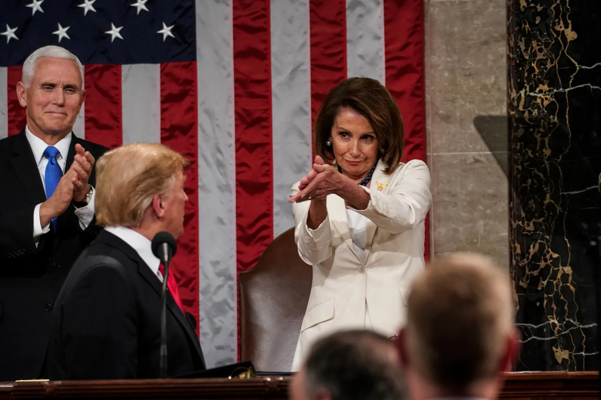 Mike Pence and Nancy Pelosi applaud Donald Trump during a State of the Union address&nbsp;in Washington, D.C. on Feb. 5, 2019.