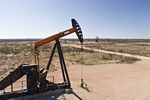 Pumpjacks operate on oil wells in the Permian Basin.
