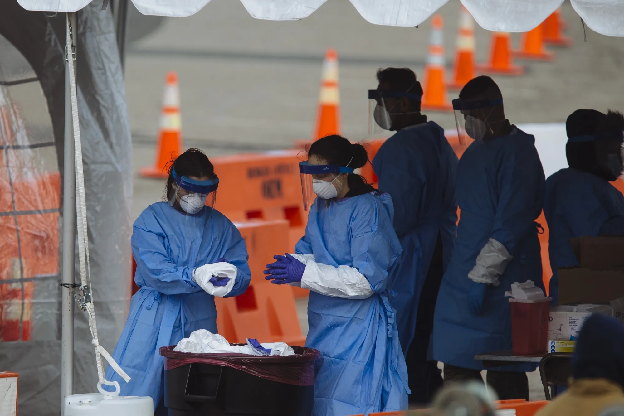 Medical workers&nbsp;at a drive-through coronavirus testing facility in Paramus, New Jersey on March 21.