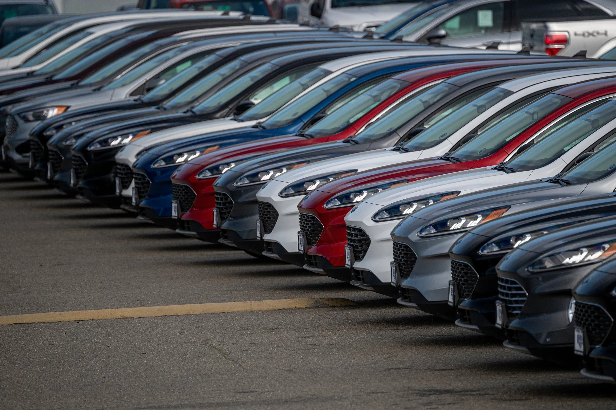 Vehicles for sale at a Ford dealership in Colma, California.