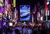 A sign welcomes the USS Abraham Lincoln Carrier Strike Group on Walking Street in Pattaya, Thailand, on Sept. 2. 