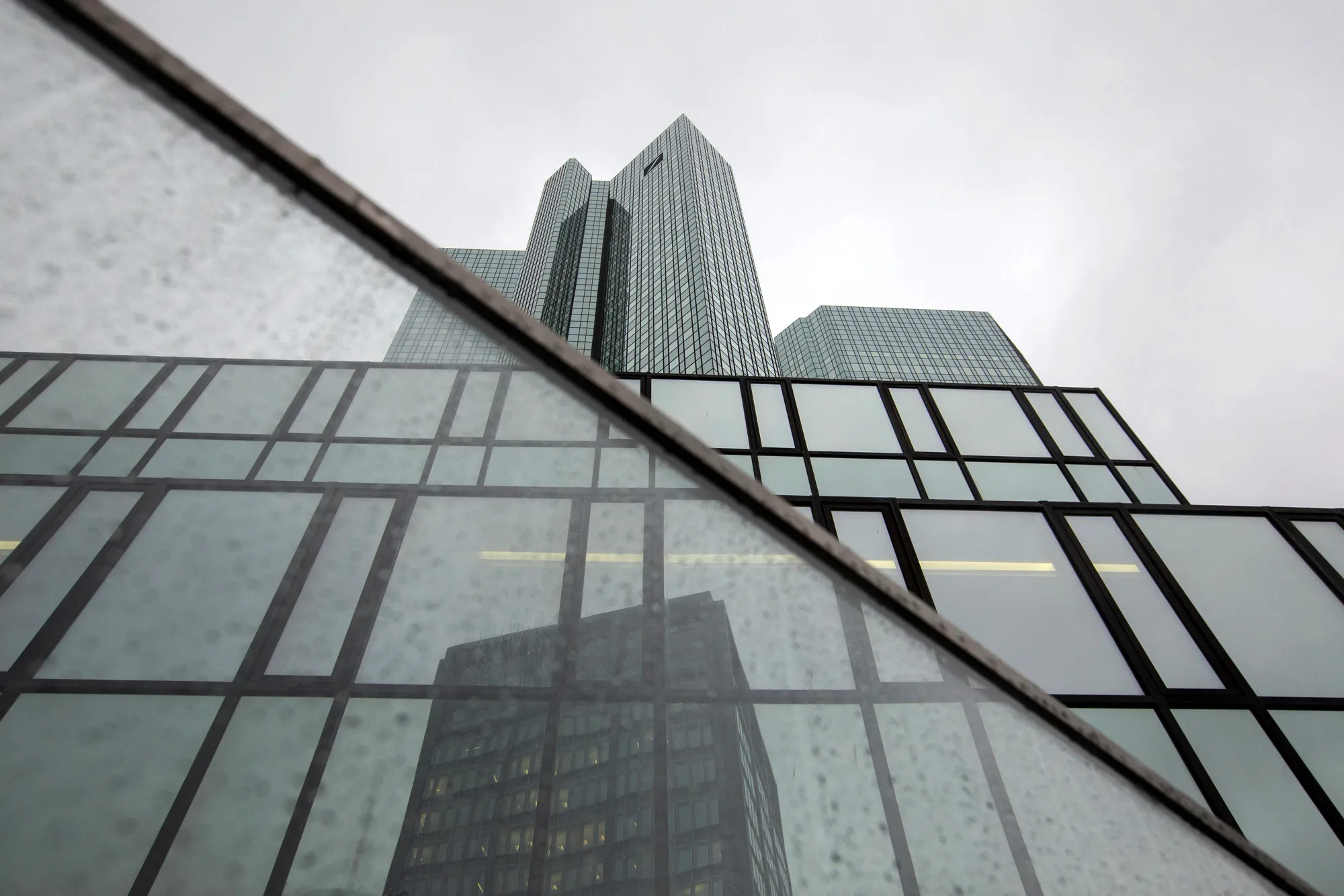 The twin tower skyscraper headquarter offices of Deutsche Bank AG stand in Frankfurt.
