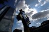 The euro sign sculpture stands near the former European Central Bank (ECB) headquarters in Frankfurt, Germany, on Wednesday, April 25, 2018. About 8,000 additional jobs may be created in Frankfurt’s banking industry, a statement from the Government of Hesse state says, citing estimates by Helaba Research.