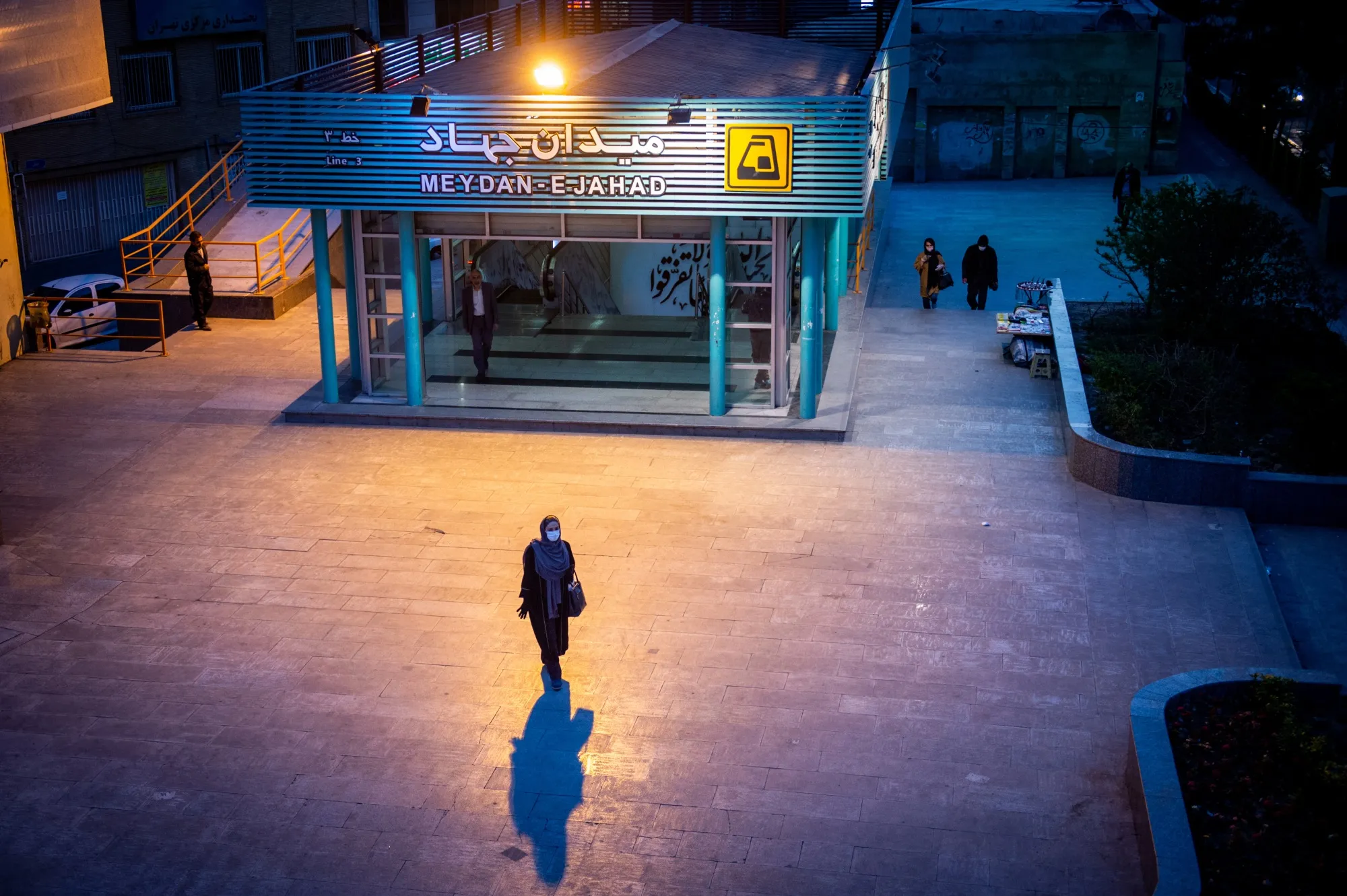A pedestrian exits a metro station wearing a protective mask in Tehran, Iran, on&nbsp;March 15.