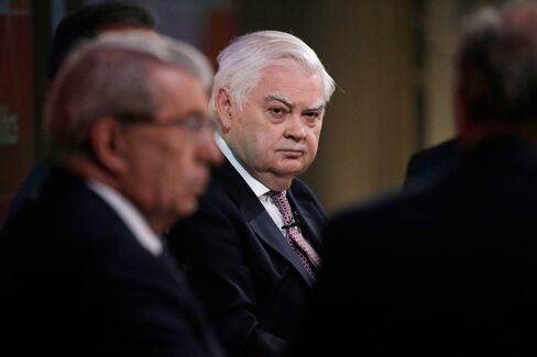 Norman Lamont, former U.K. chancellor of the exchequer, center, looks on during a panel discussion at Bloomberg L.P.'s U.K. Europe Debate in London, on April 9.