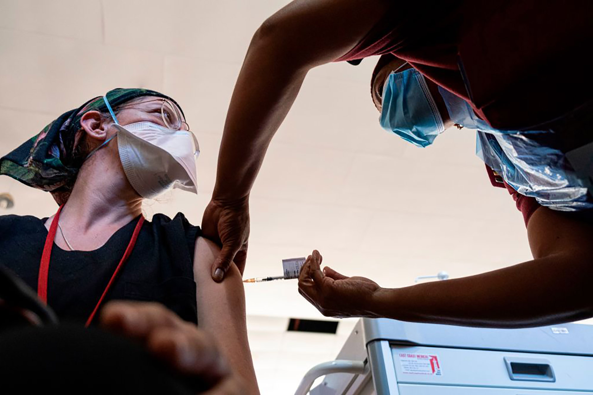 A worker administers the Johnson and Johnson vaccine at a hospital in Soweto.&nbsp;