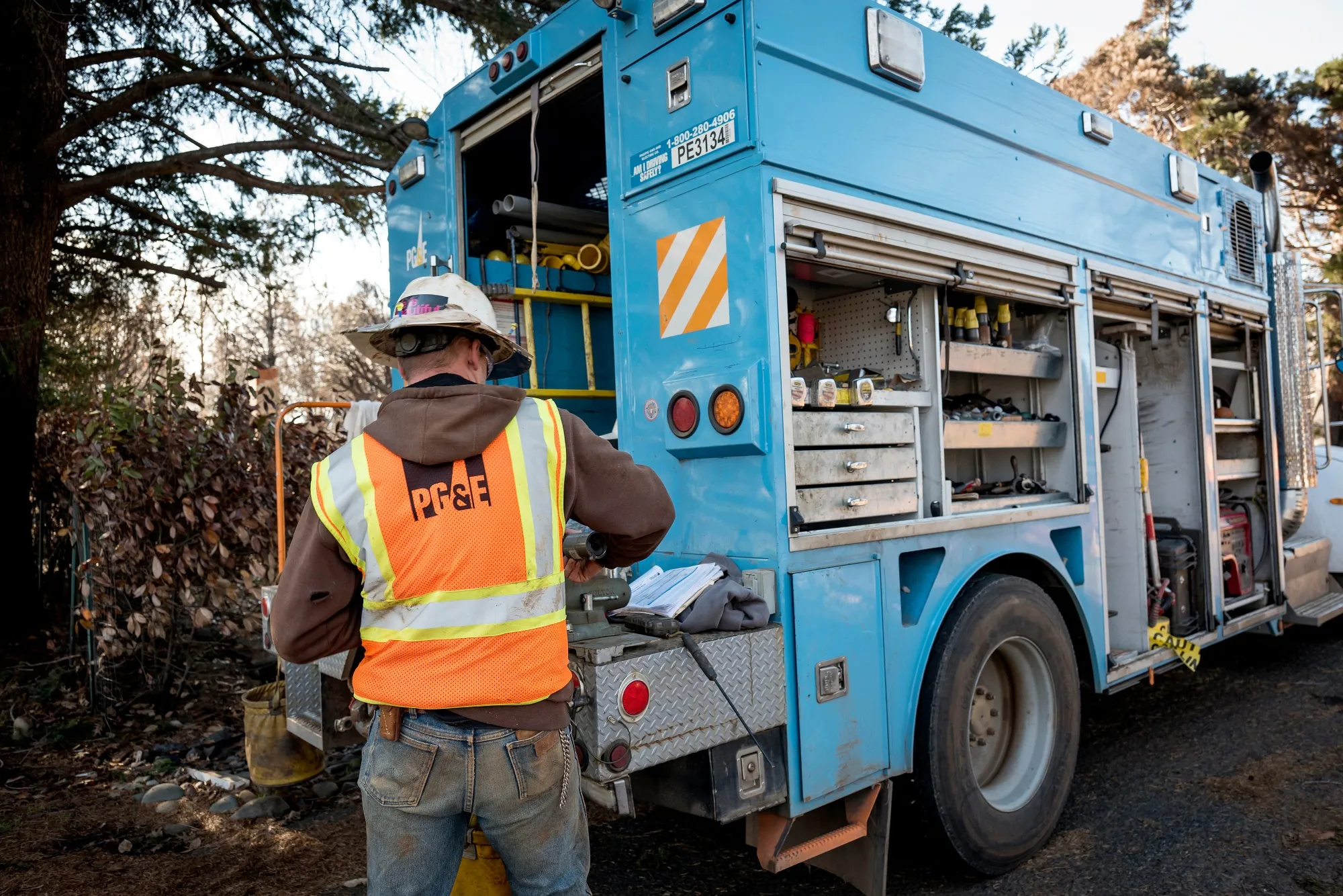 A Pacific Gas &amp; Electric Co. (PG&amp;E) employee works out of a truck in Paradise, California, U.S., on Tuesday, Jan. 22, 2019.&nbsp;