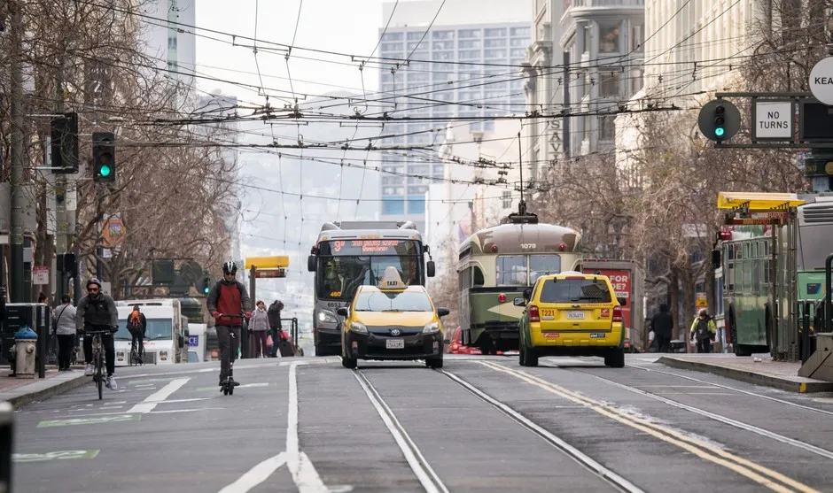 Bikes, scooters, buses and streetcars are reaping the benefits of the ban of private cars on San Francisco's Market Street.