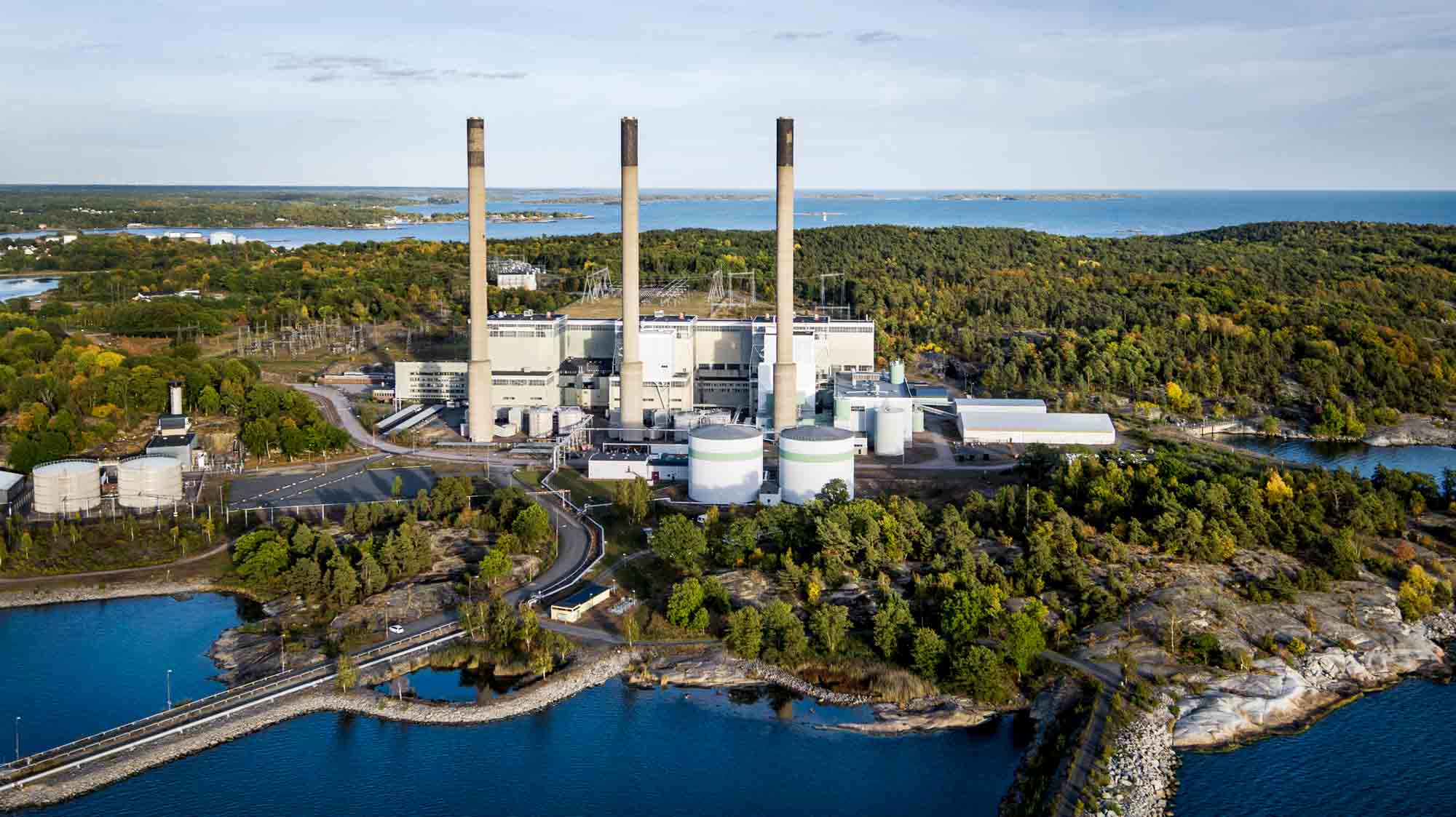 Karlshamnsverket power station with its tall smokestacks.