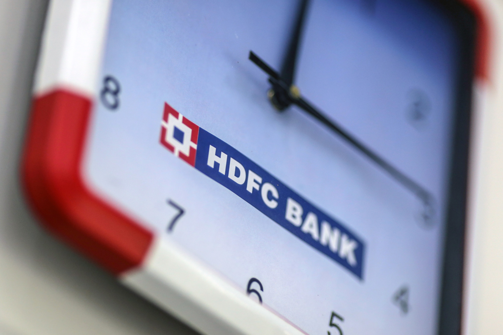 Signage on a clock at a HDFC Bank Ltd. branch in Mumbai