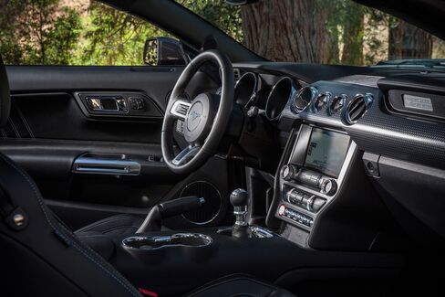 Ford reworked its Mustang interior to look like a plane's cockpit, including toggle switches.