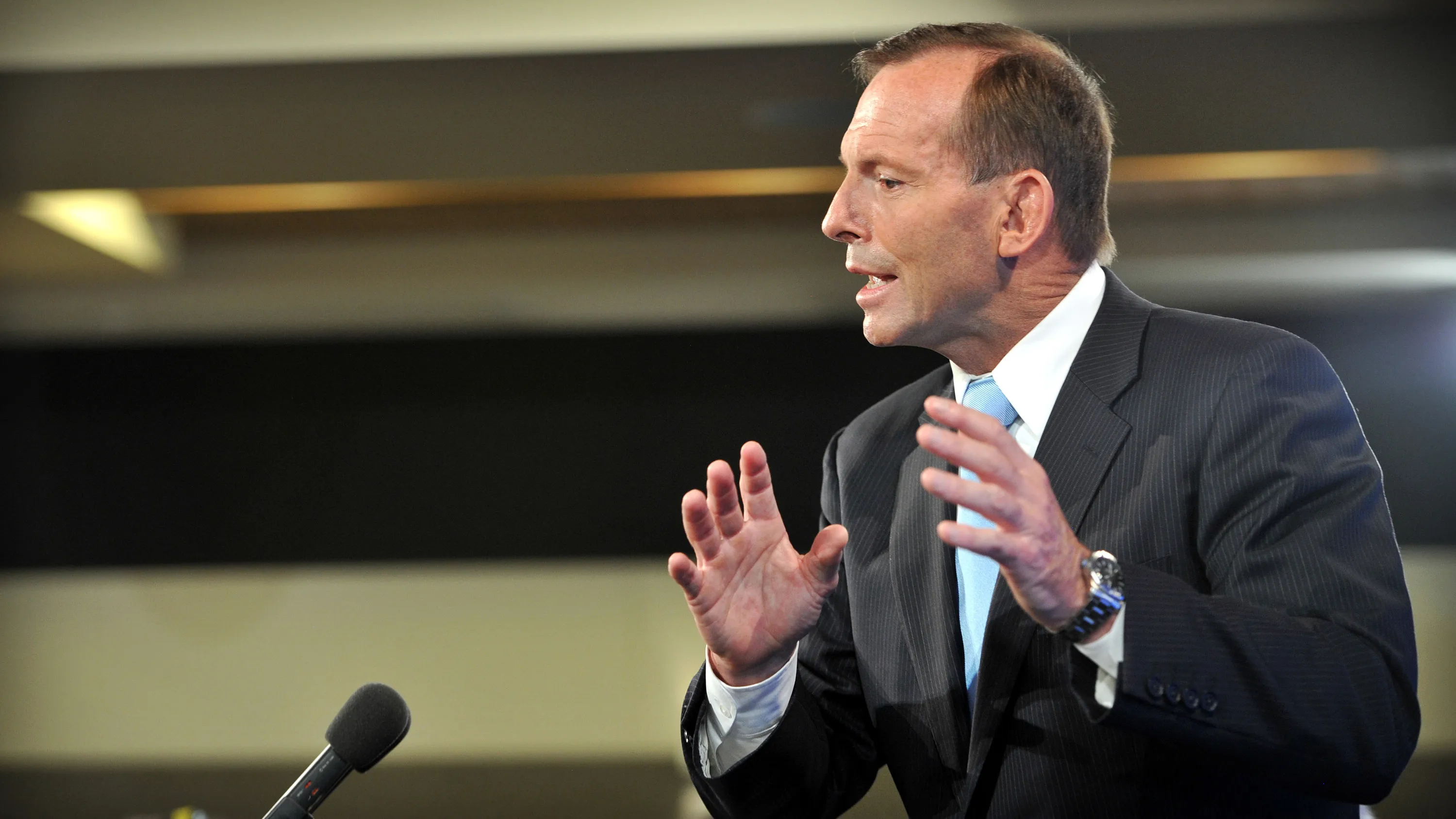 Tony Abbott, Australia's prime minister, gestures as he speaks at the National Press Club in Canberra, Australia, on Feb. 2, 2015.
