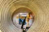 TOPSHOT - A worker welds a liquefied natural gas (LNG) tank at a factory in Nantong in China's eastern Jiangsu province on March 14, 2019. - China's industrial output slowed during the first two months of the year as unemployment rose, official data showed on March 14, while some indicators showed a slowdown in the world's second largest economy stabilising. (Photo by STR / AFP) / China OUT (Photo credit should read STR/AFP/Getty Images)