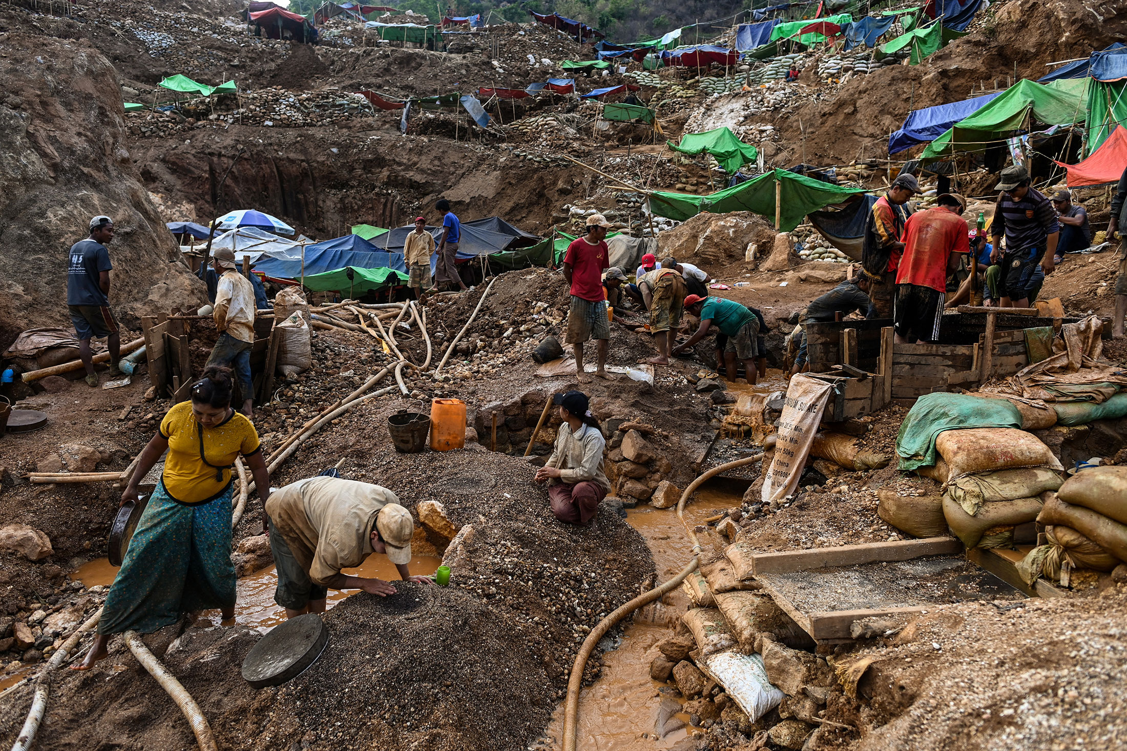 Workers in a ruby mine in Mogok, north of Mandalay.Photographer: Ye Aung Thu/AFP/Getty Images