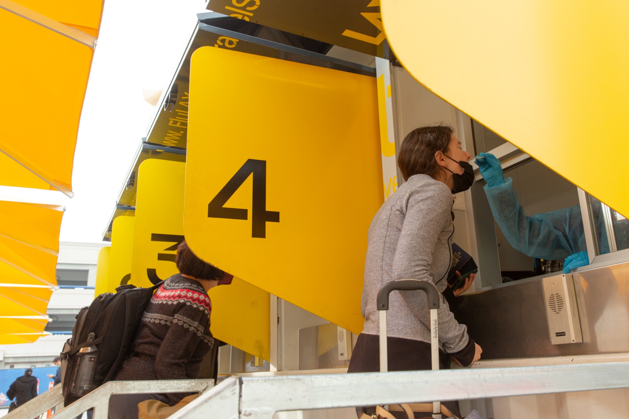 Covid has changed the long and short of it. Above: Testing at&nbsp;Los Angeles International Airport.
