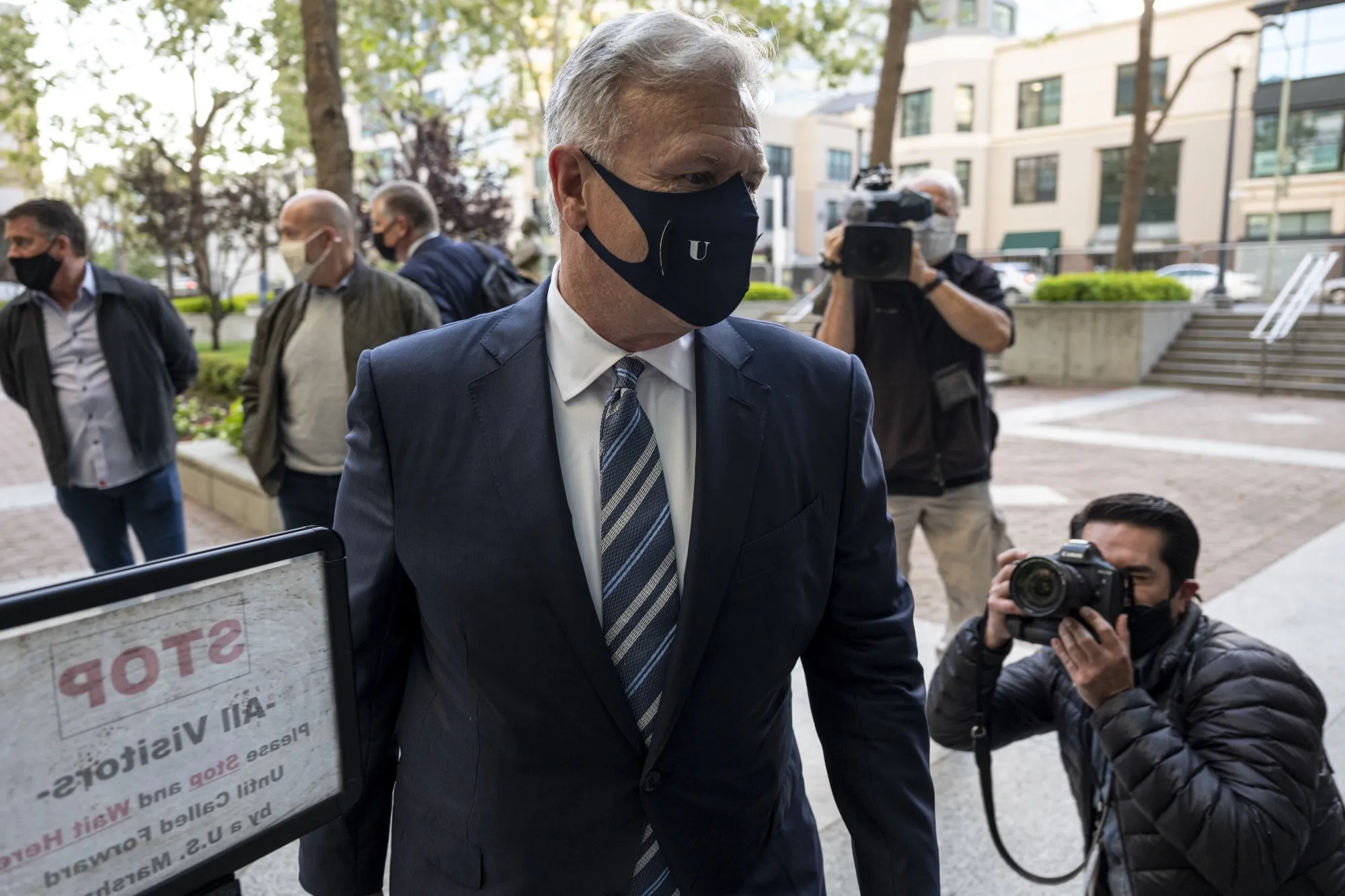 Phil Schiller arrives at U.S. district court in Oakland, California, on May, 3.