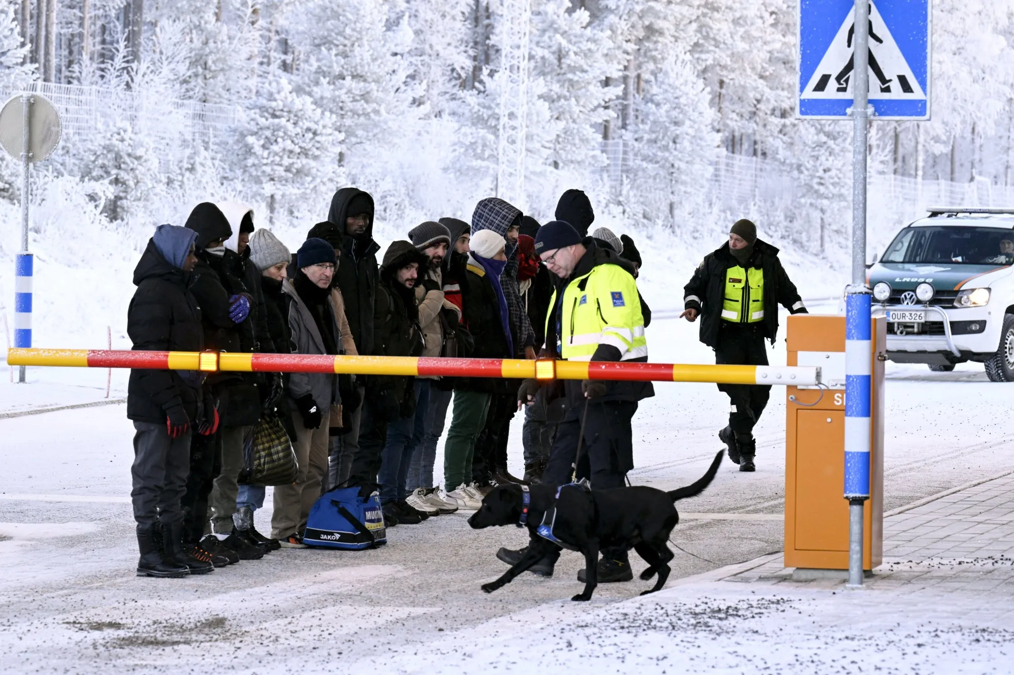Migrants&nbsp;at the border crossing in Salla, Finland. Orpo warned Russia that more border crossings would be closed if migrants continue to be brought there by Russian officials.&nbsp;