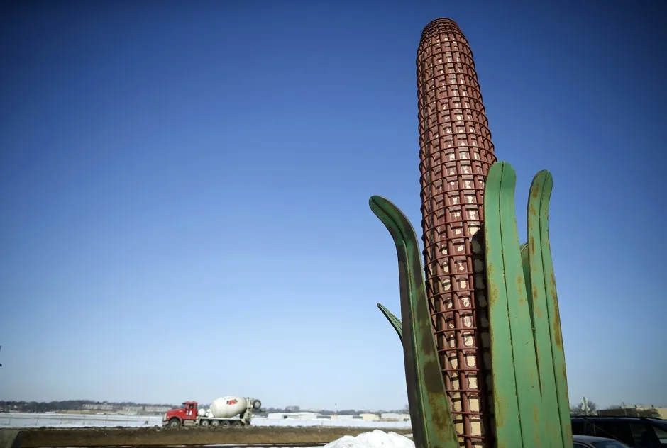 A metal sculpture in the shape of a corn cob near a road in Iowa City, Iowa.