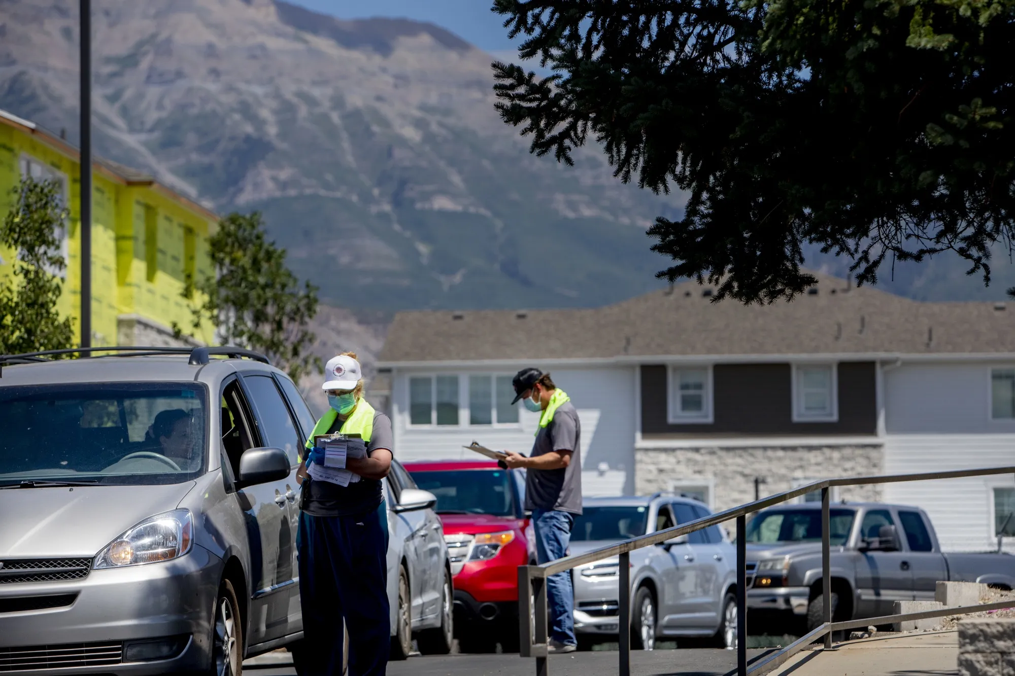 Vehicles wait in line to enter a Covid-19 testing site in American Fork.