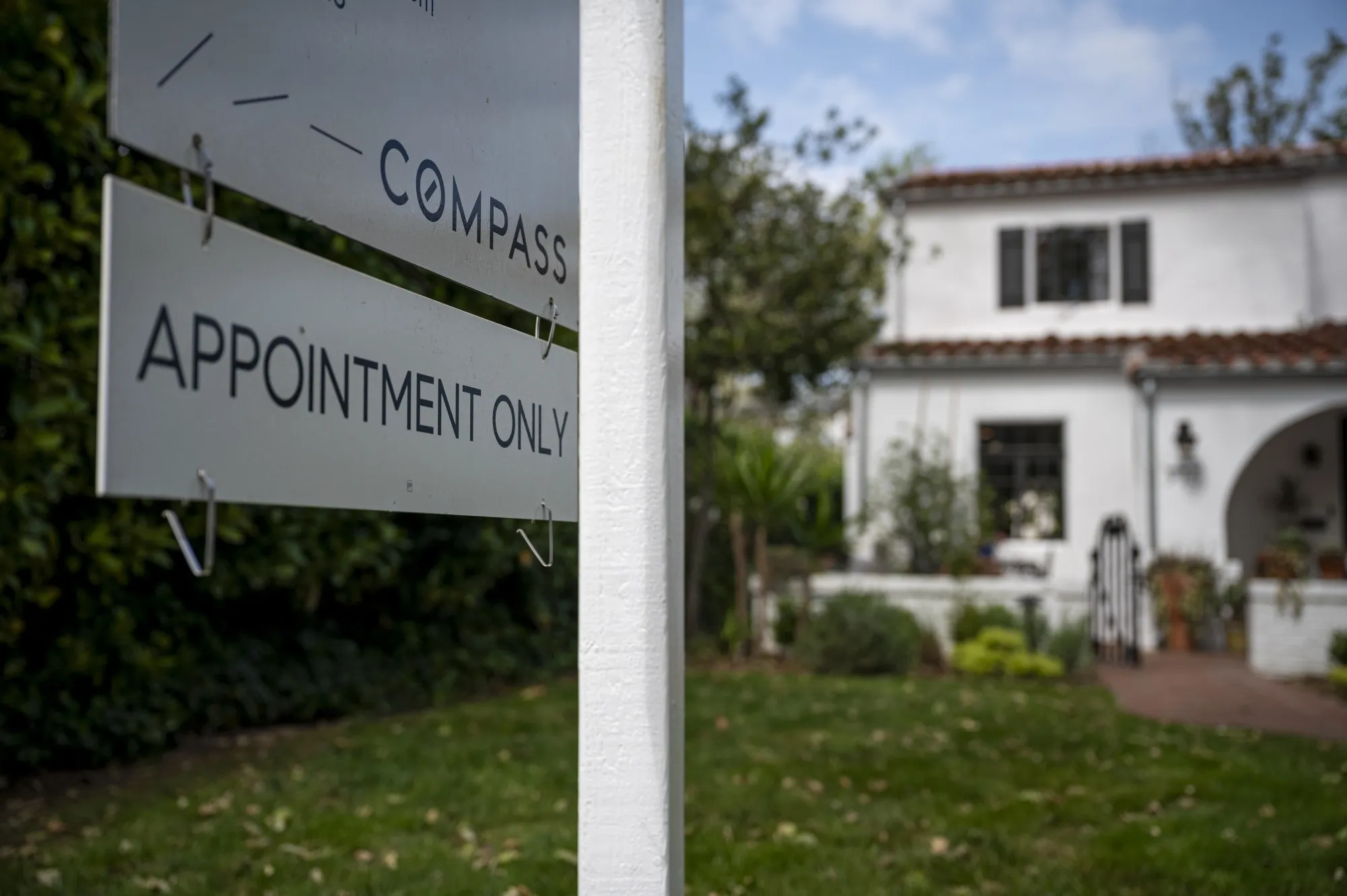 A Compass sign outside a home for sale in Sacramento, California, in 2024.