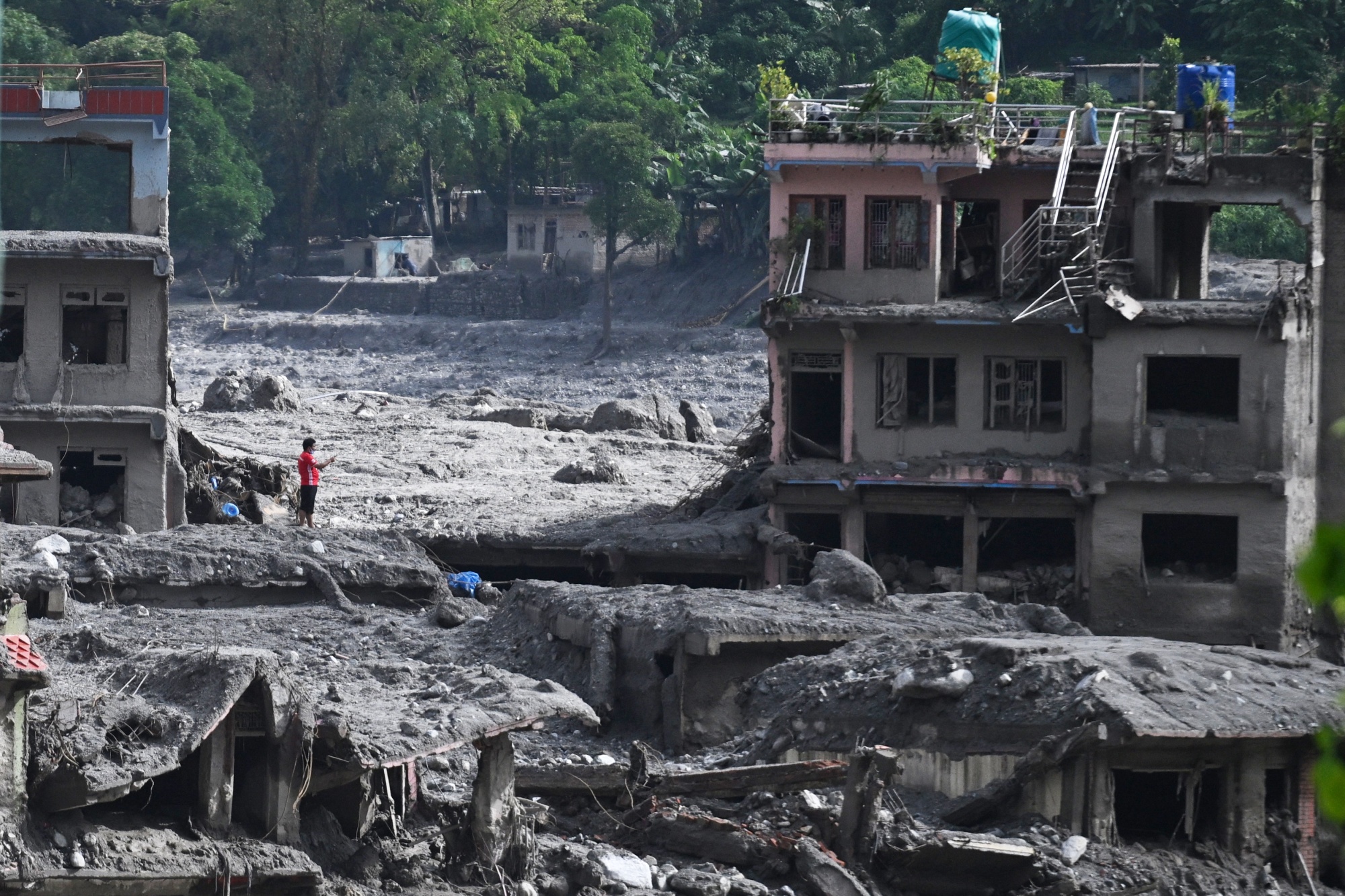 Image associated with story "Nepal-China Flood Deaths Top 1,000 as Rescuers Seek Survivors"