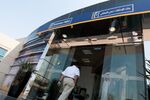 A customer enters an Emirates NBD PJSC bank branch in Dubai. 