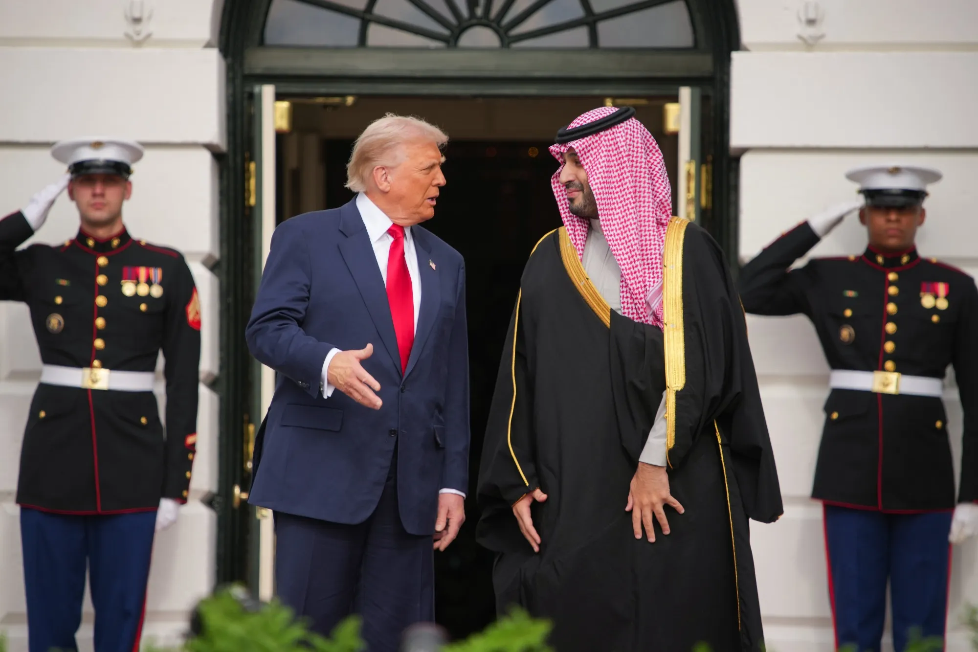 US President Donald Trump speaks with Crown Prince and Prime Minister Mohammed bin Salman of Saudi Arabia as he arrives to the White House in Washington on Nov. 18.